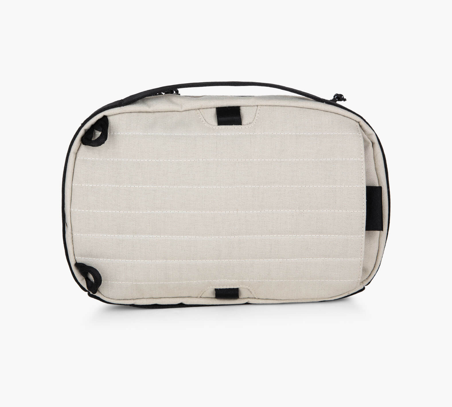 Sand colored Everyday 5L Sling bag with black handle and black accents, shown from the front on a white background