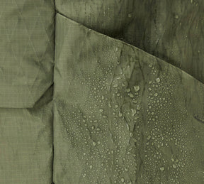 Close-up of the Aeroweave fabric in Cypress with water droplets, highlighting water-resistant material