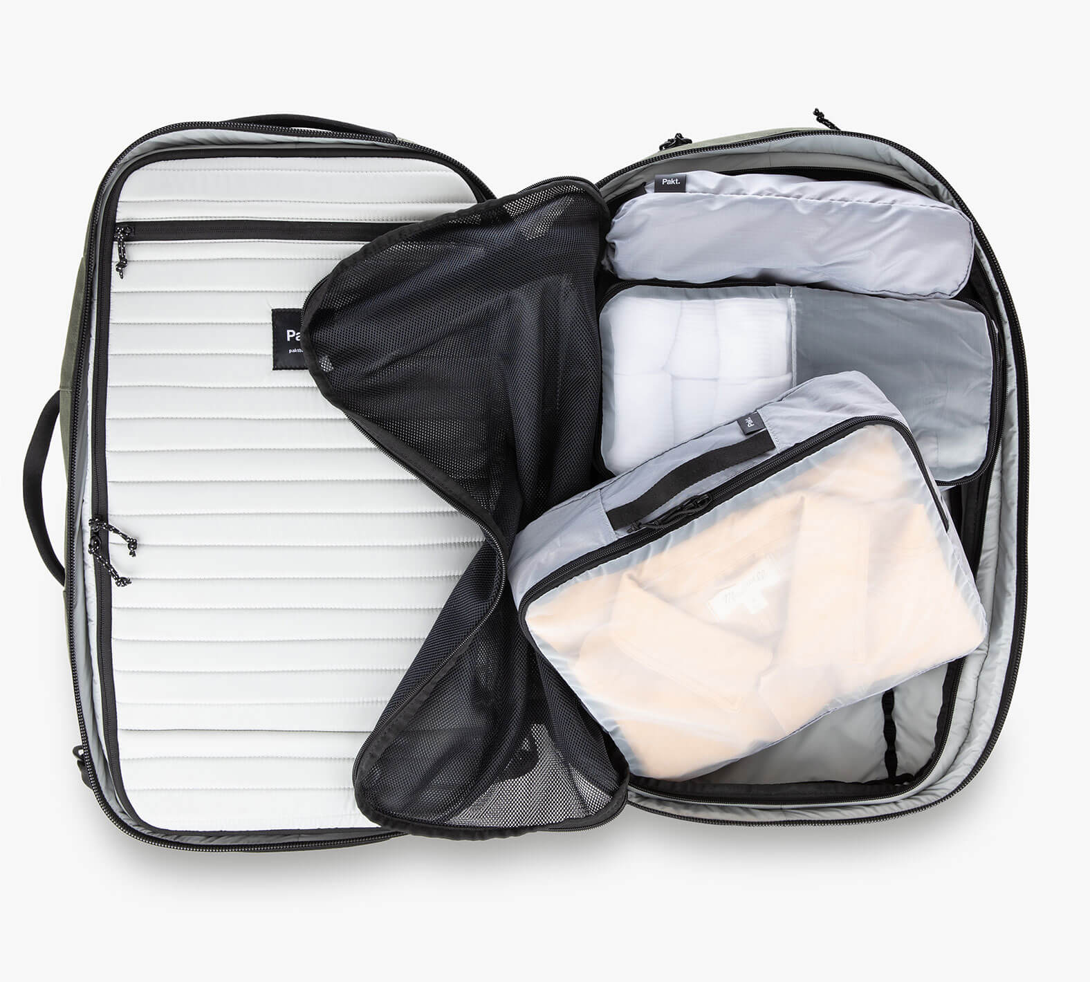Open carry-on suitcase with gray packing cubes and mesh divider, showing Grandcart. brand tag