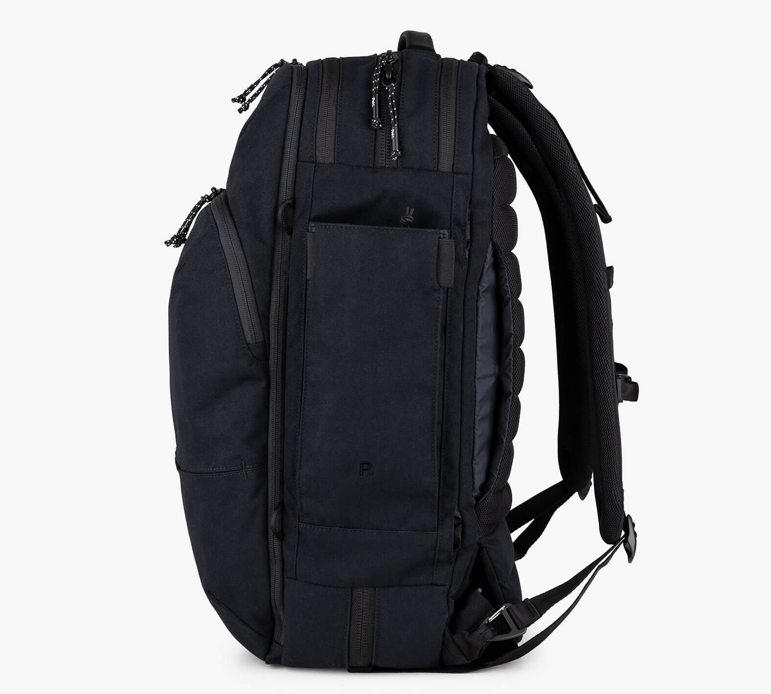 Side view of a black travel backpack with multiple compartments and padded shoulder straps.