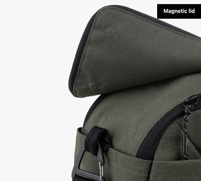 25L travel duffel with open Magnetic lid, green canvas top flap, zippered main compartment and side D-ring