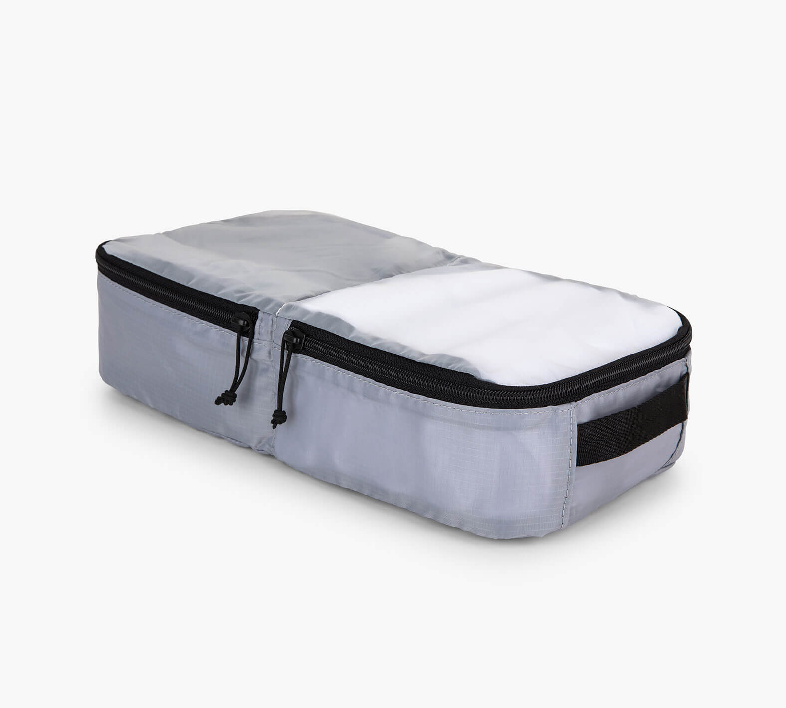 Light gray rectangular packing cube with dual black zippers and side handle