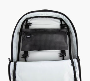 Black and white checkered Clip-In Pouch with clips inside a white sling bag