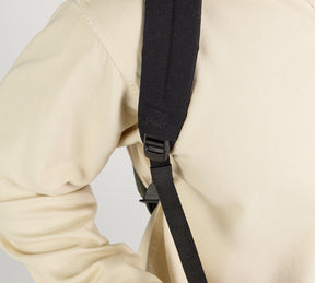 A front close up shot showing the premium 15l shoulder strap on model.