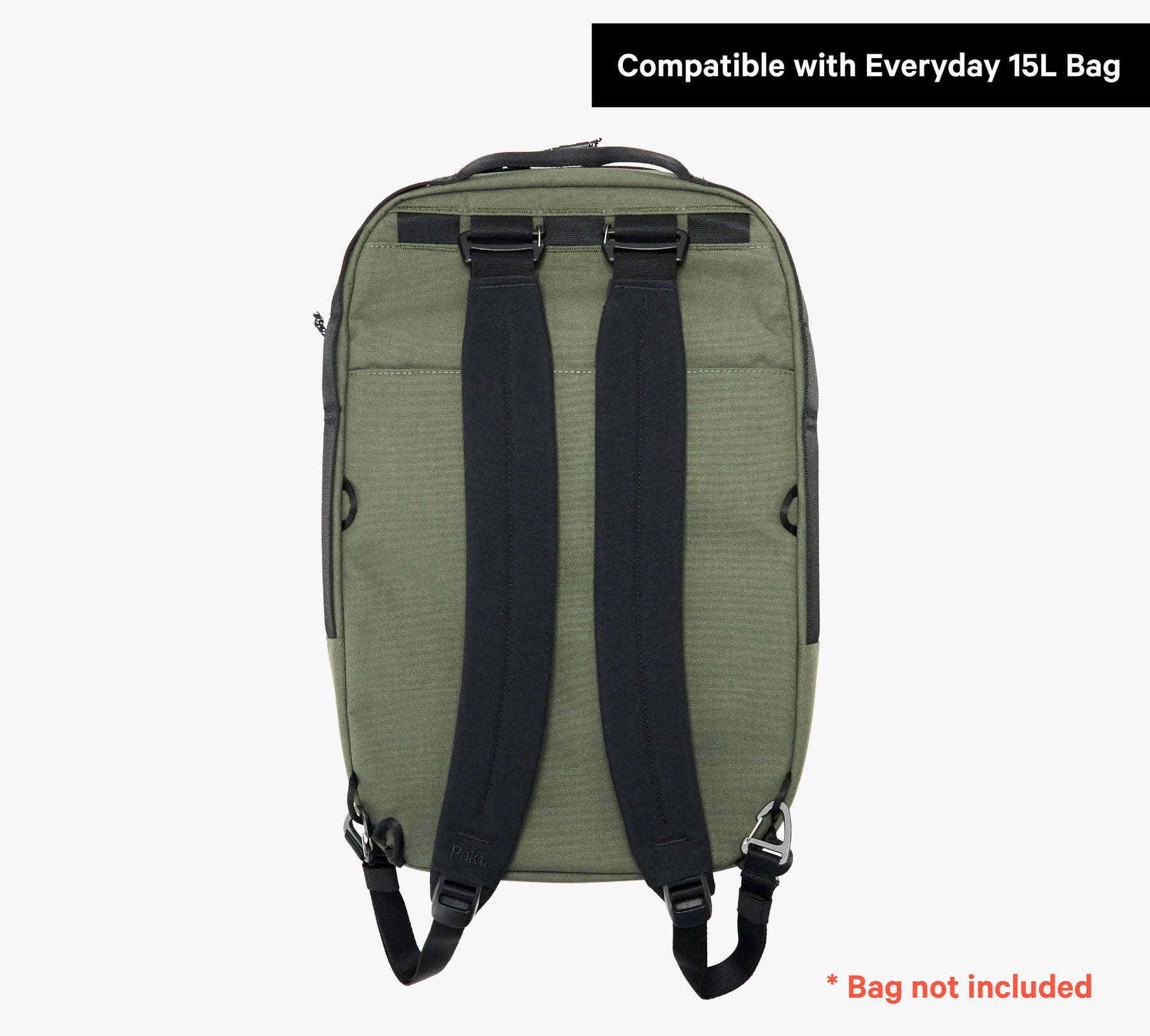 Back side of a green backpack with black straps, labeled 'Compatible with Everyday 15L Bag', note '* Bag not included'