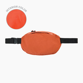 The Stash 4L Sling in Sumac on a white background. To the left there is a circular swatch showing the interior color of Sumac.